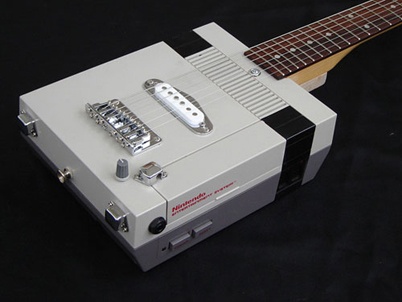 http://www.holeinthedyke.com/images/hitd-more/nintendo-guitar.jpg
